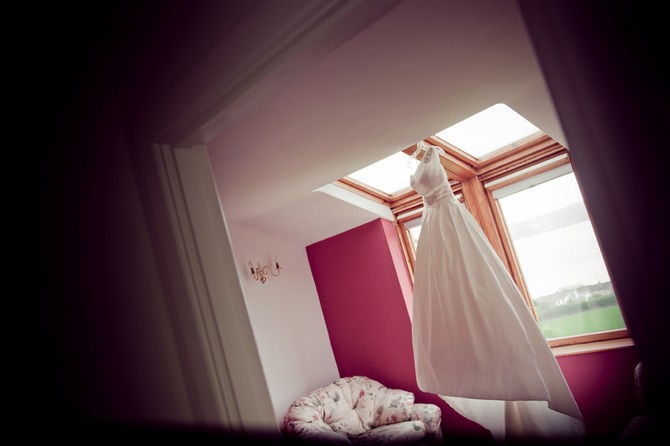 wedding dress hanging photo